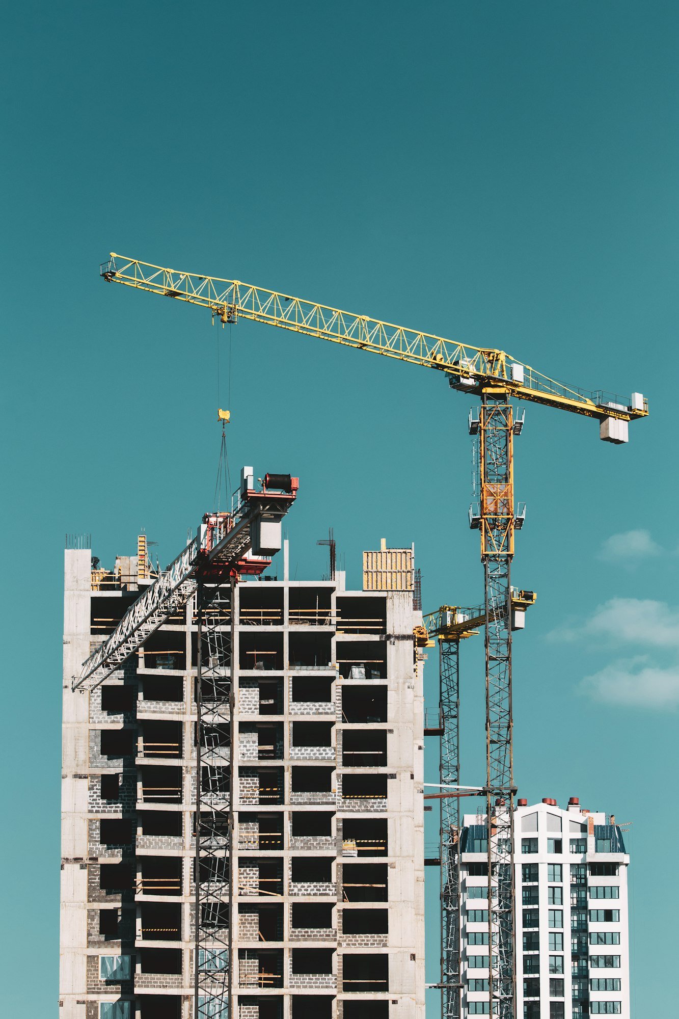 Construction Crane Is Involved In Construction Of A New Multi-st